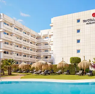 NH_Collection_Marbella__Facade_From_Pool.webp