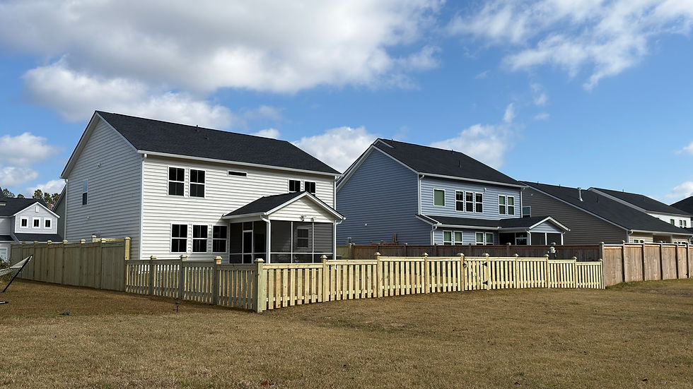 wood fence and houses