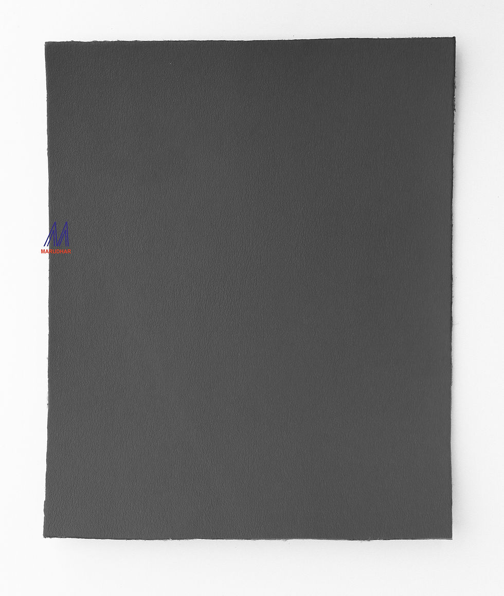 縮圖：A worker inspecting a piece of superfine microfiber safety material, used in the production of high-performance work gloves.