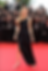 Bella Hadid showcasing some stunning looks including a Saint Laurent gown - Getty Images