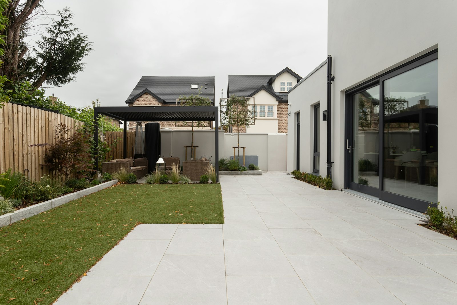 House with a large yard and a covered patio