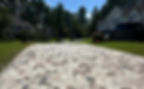 Driveway pavers installed with a modern and elegant design