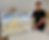 Person painting colorful landscape on large canvas