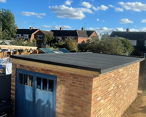 New three layer built up felt system and timbers installed