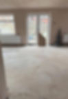 Renovation gallery showing an empty room with glass doors
