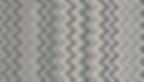 Diamond patterned wool rug in stone and grey.