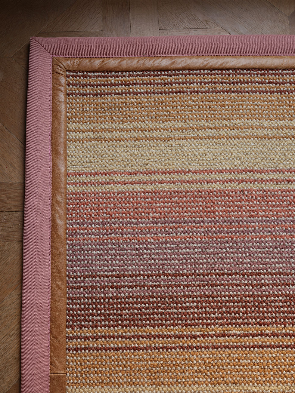 Thumbnail: Aura Glow Wool Rug with soft coral and caramel border.