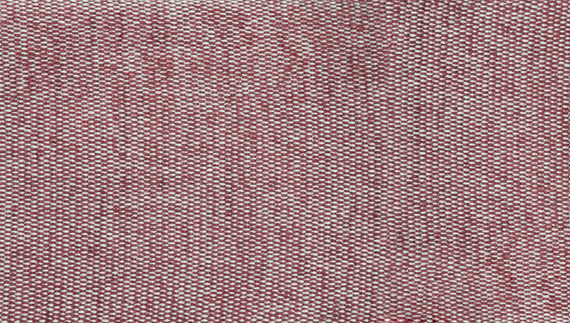 Thumbnail: Close-up of a red and white woven seagrass rug with a textured pattern.