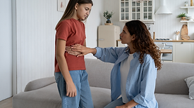 Child blowing their nose.