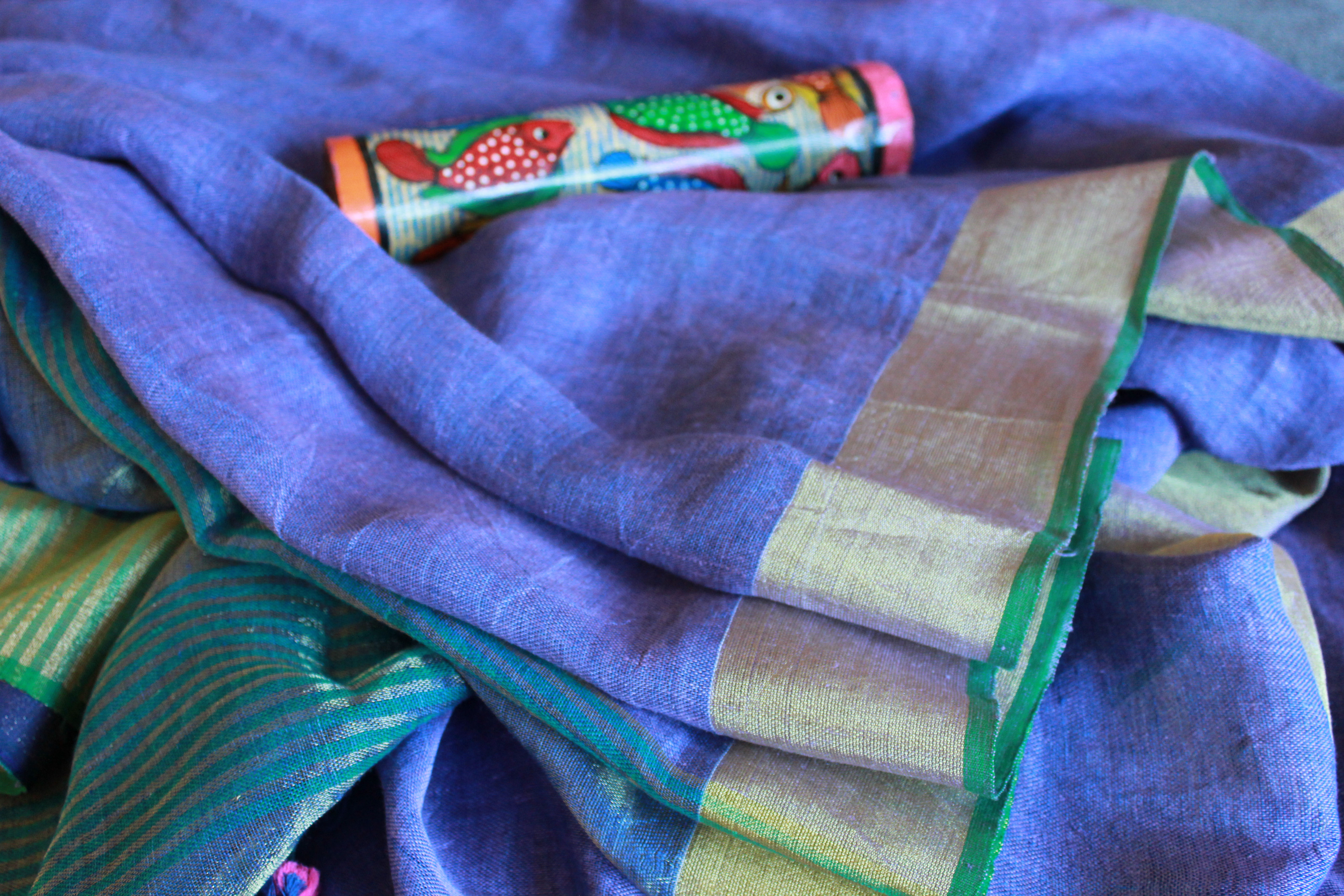 Azure with golden zari border with green trim linen by linen handloom saree