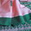 Thumbnail: Assam weave in pastel pink with a green border