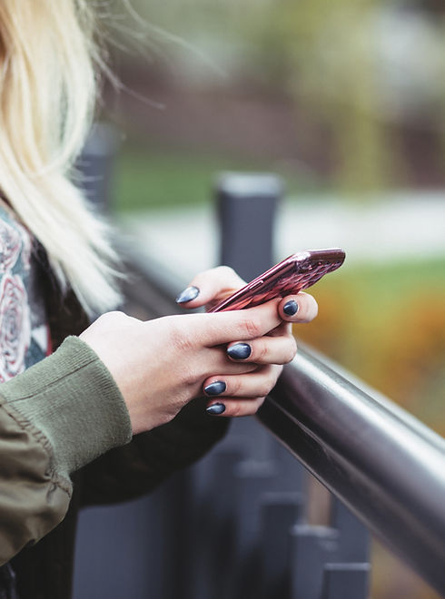 Woman Holding a Mobile Phone
