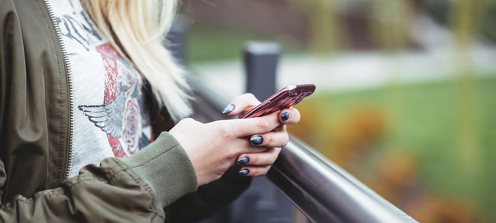 Woman Holding a Mobile Phone