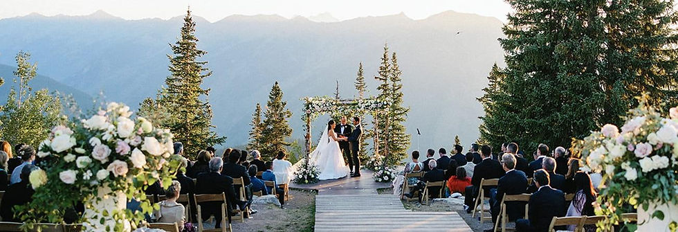 Elegant Colorado wedding with floral design and mountain backdrop representing wedding planning and coordination.