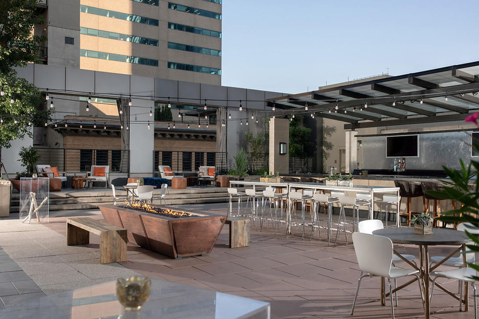 Pool Terrace at Four Seasons Hotel Denver set with cocktail tables for an outdoor corporate reception in downtown Denver.