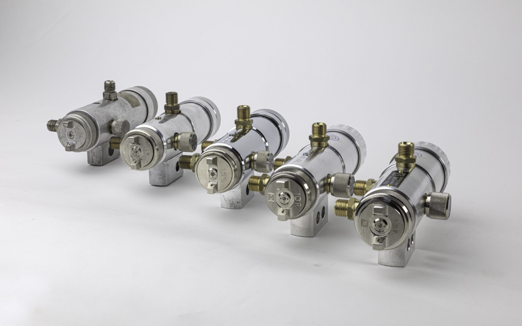 Automatic spray guns for a leather finishing spray line — Kymera Group spare parts supplier