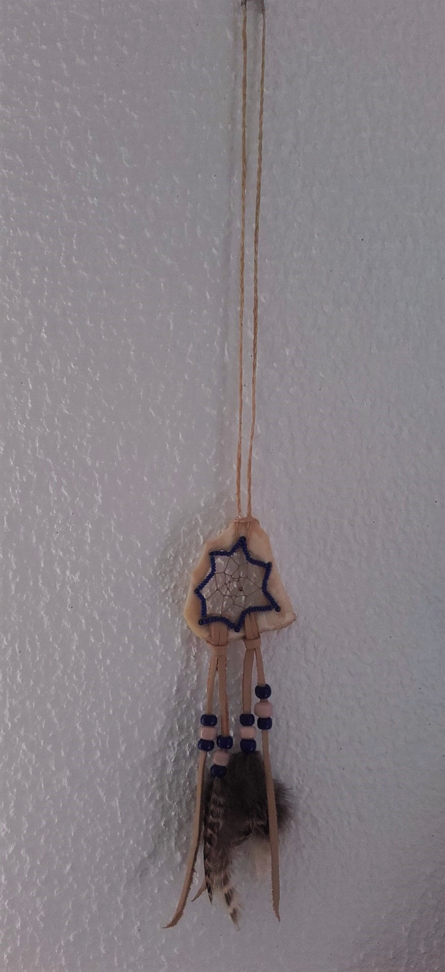 Miniature : Pendentif attrape-rêves en os - ref: NDC 11