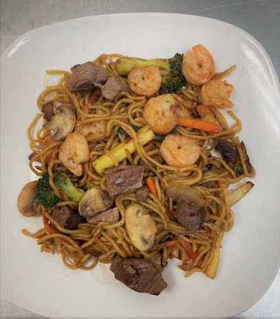 Steak and jumbo shrimp plate