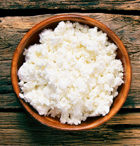 A bowl of cottage cheese that is rich in protein and other nutrients