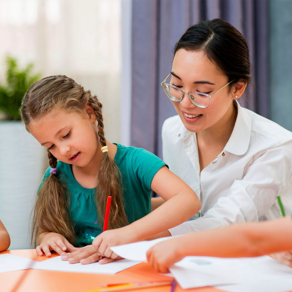 young-teacher-helping-her-students-class_edited