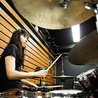 Woman Playing Drums