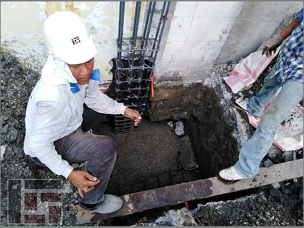 4 pouring of cement in the foundation.jp