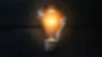 a lightbulb on a black background