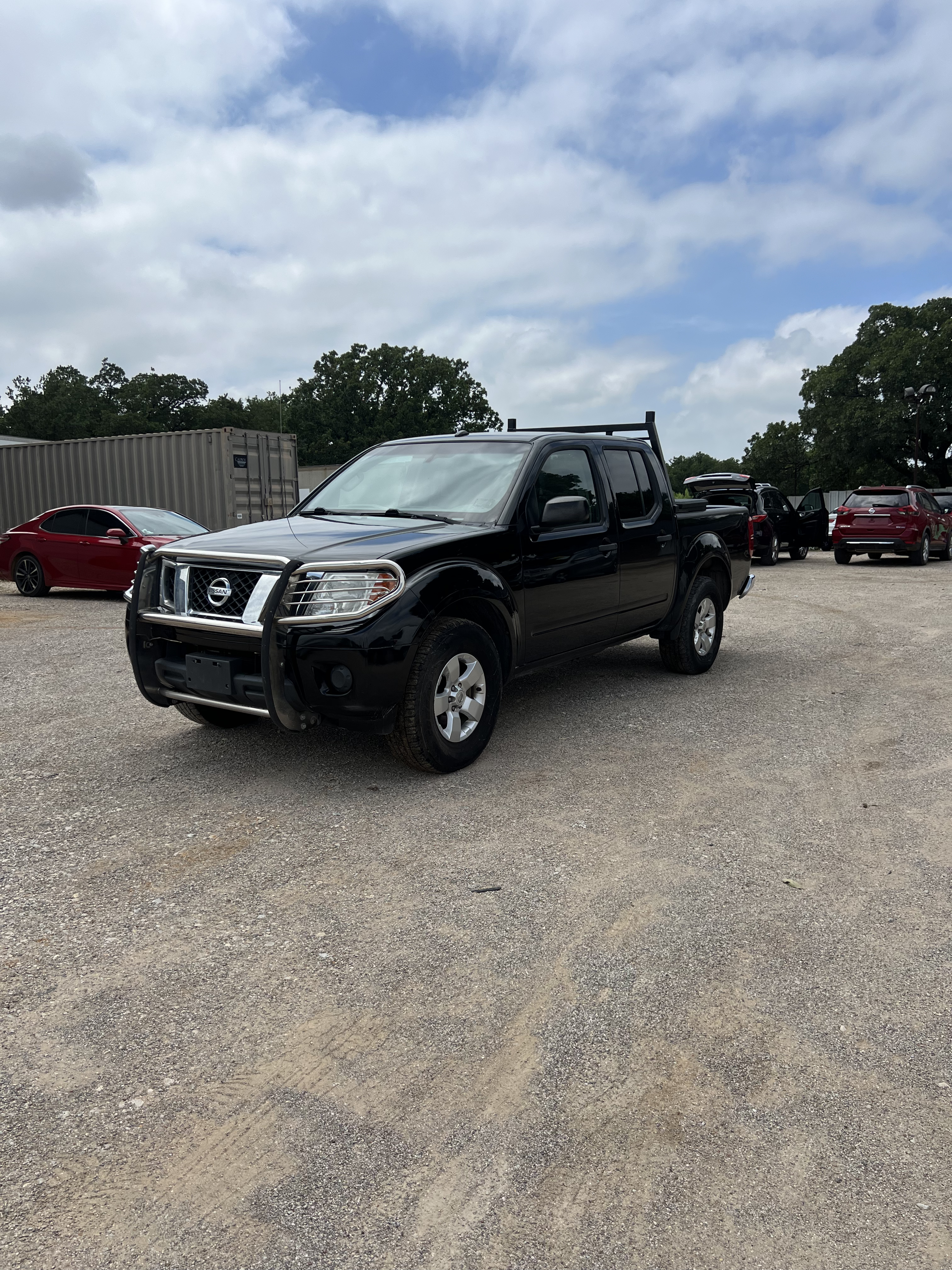 2013 Nissan Frontier 4.0 SV Crew Cab 4X4 AT SWB's photo