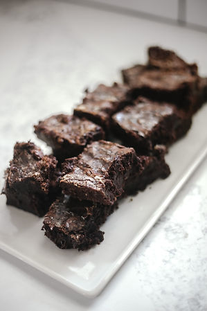Sourdough discard caramel brownies on a tray