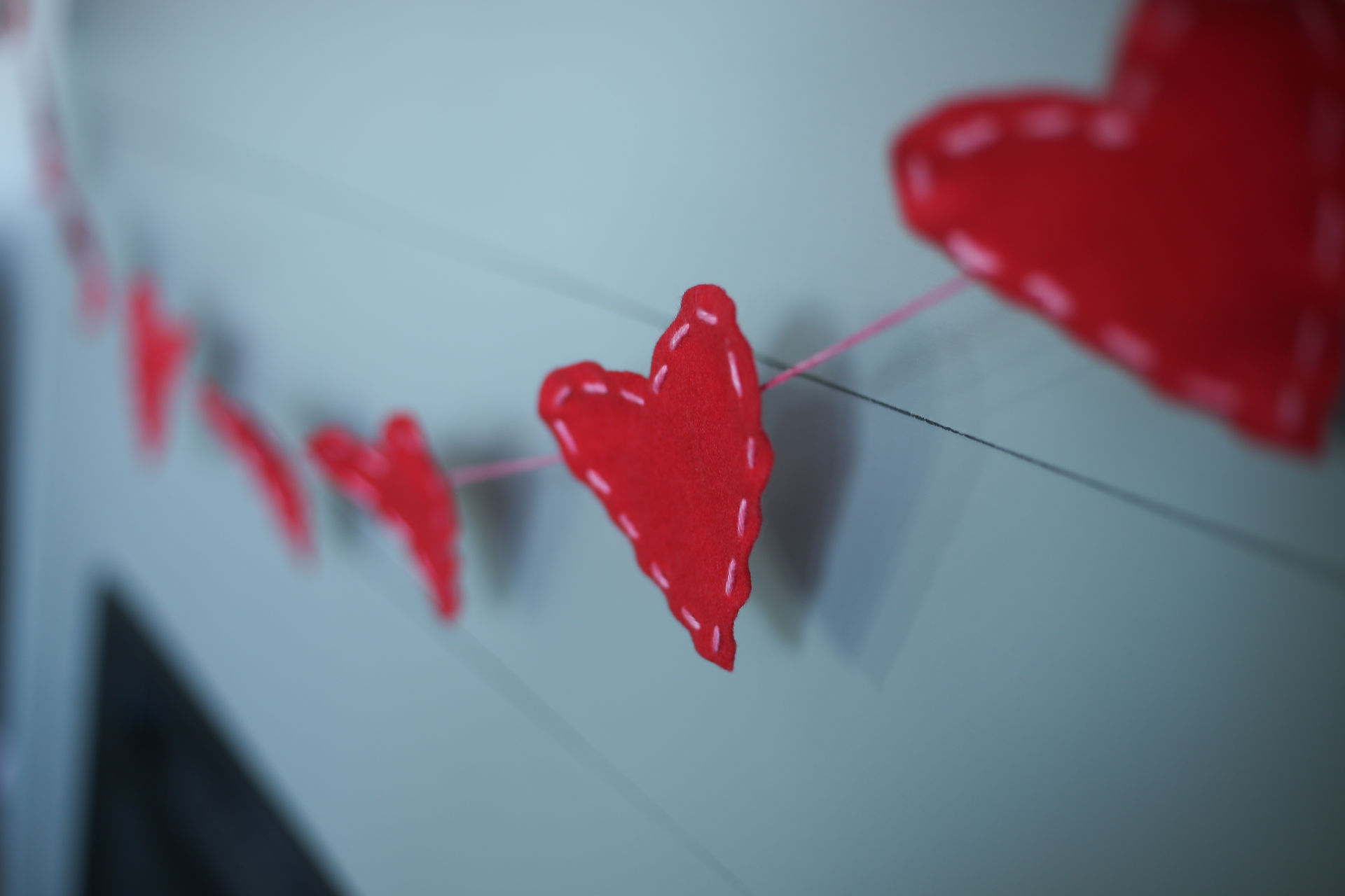 finished valentine's day banner hanging from mantle