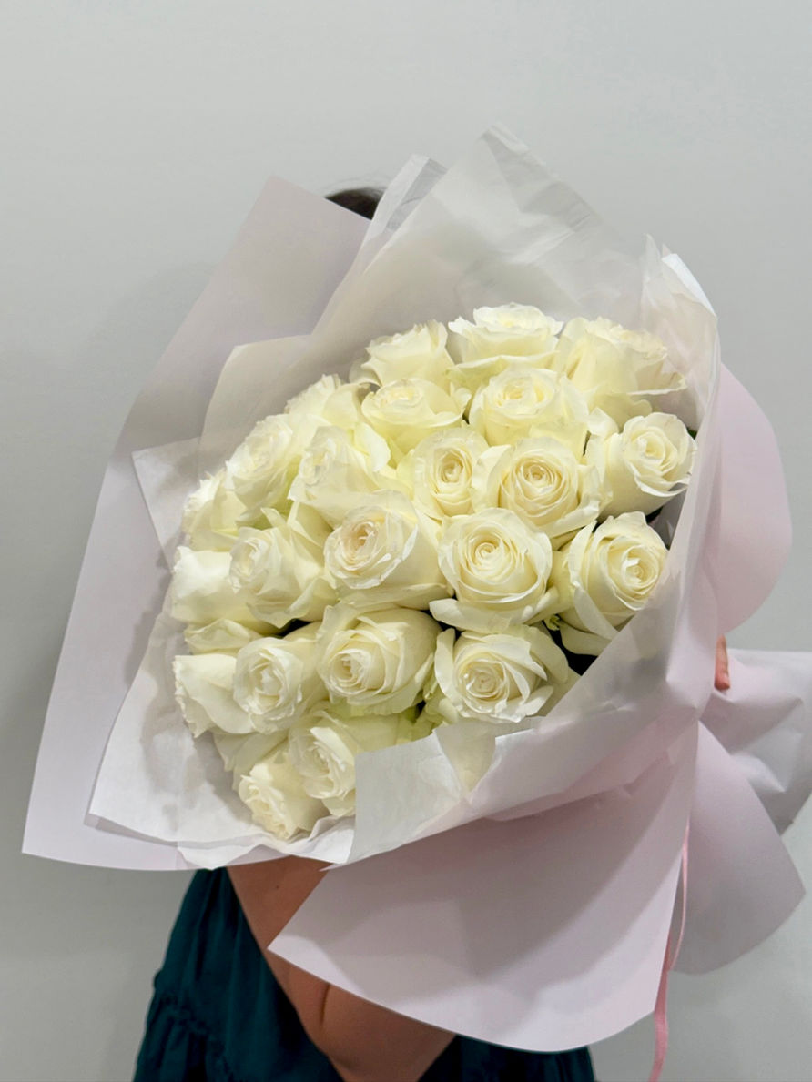 White roses are a symbol of purity, sincerity, and new beginnings.