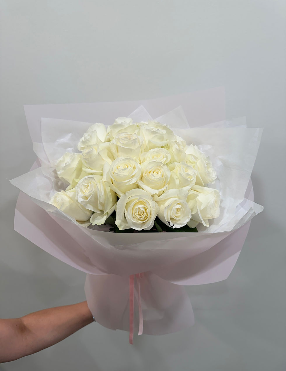 White roses are a symbol of purity, sincerity, and new beginnings.