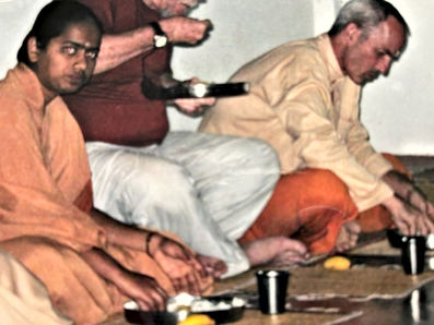 Fr. Cyprian with sangha having a meal shantivanam, India.jpg