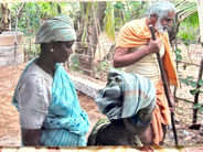Br. George (older) working with villagers.jpg