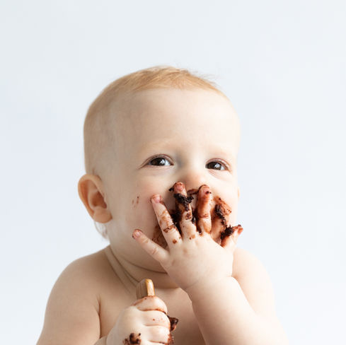 Cake Smash with baby girl by Caz Wales Photography in Thame, Oxfordshire