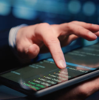 male-system-administrator-inspecting-big-data-tablet-working-modern-data-center-infrastruc