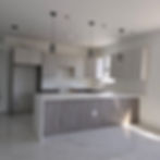 Luxury custom made kitchen with wood grain cabinets