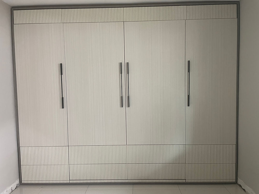 Full-wall custom made luxury closet with modern light design