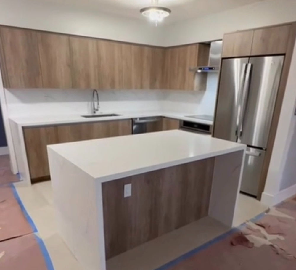 Luxury custom made kitchen with wood cabinets and island