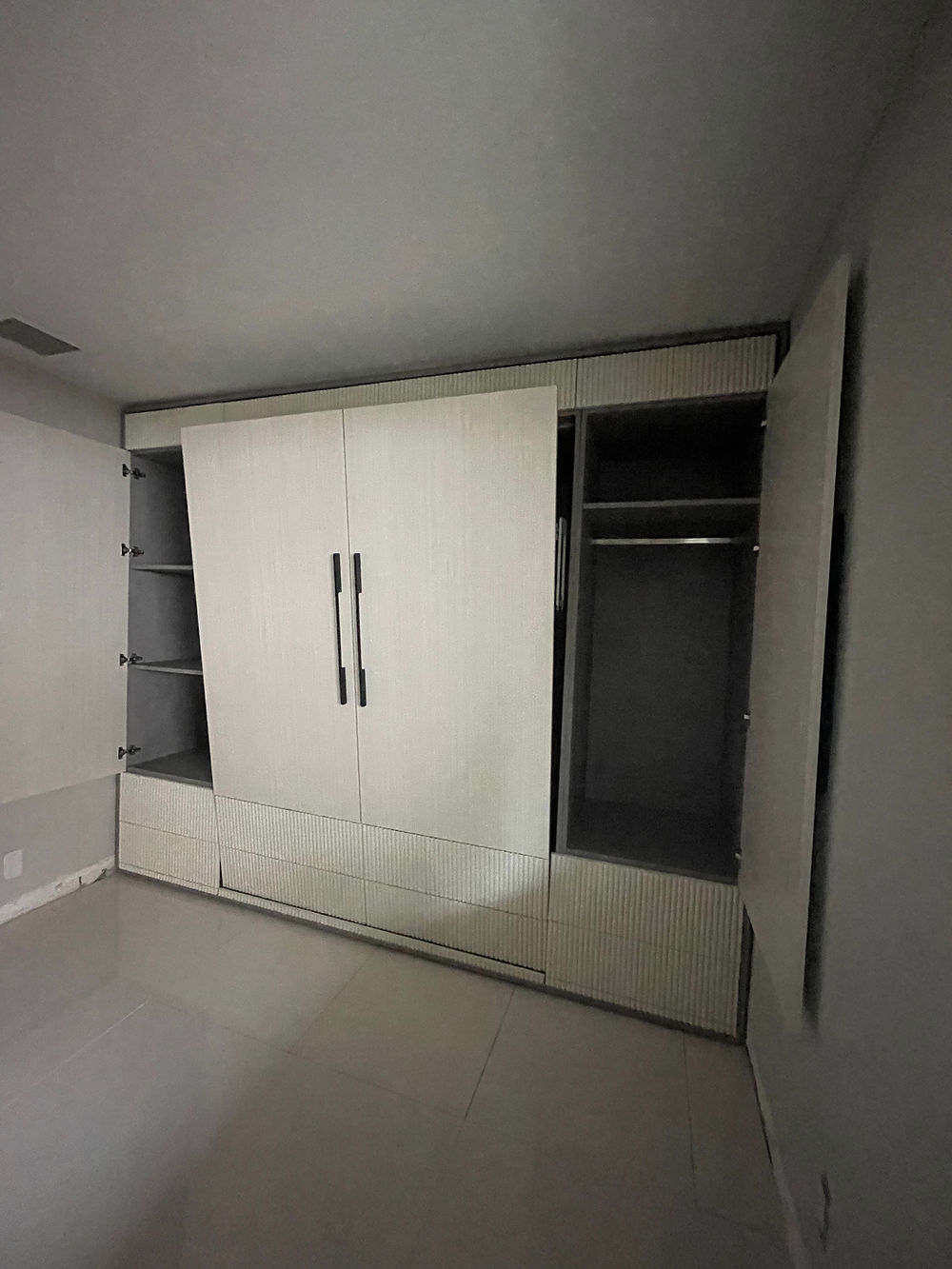 Modern custom made luxury closets with open and closed compartments