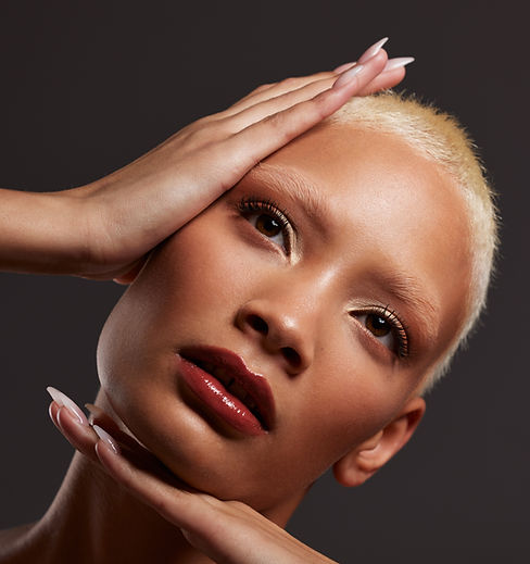 Skincare, makeup and black woman with hands on face in dark studio, platinum hair isolated