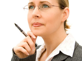 Business woman thinking.