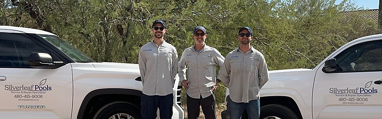 Some of the core members of the Silverleaf Pools team with our fleet of service trucks.