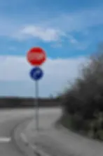 A stop sign on a British road