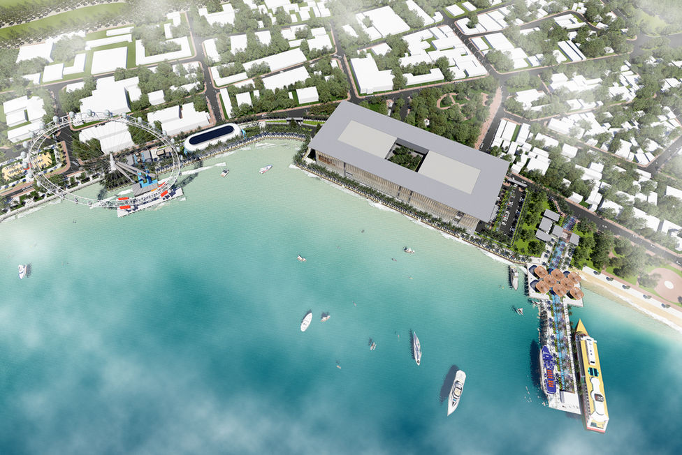 Aerial top-down architectural master plan of a coastal city featuring a convention center, marina, beach, and Ferris wheel.