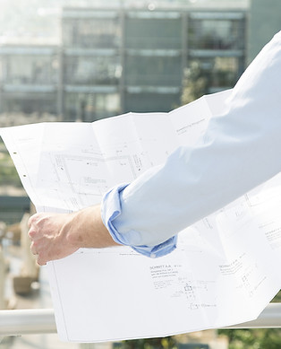 Architect hold plans