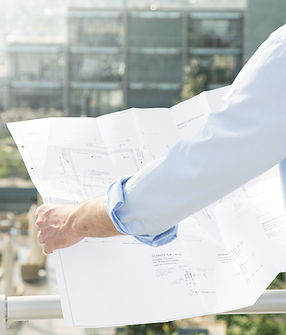 Architect hold plans