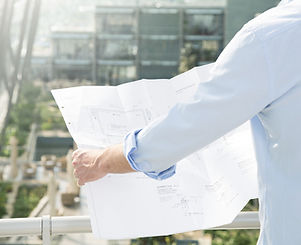 Architect hold plans
