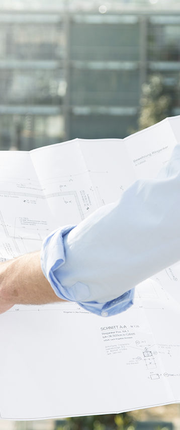 Architect hold plans