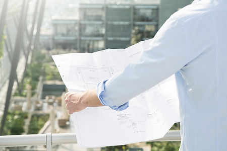 Architect hold plans